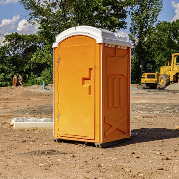 how often are the portable restrooms cleaned and serviced during a rental period in Avery